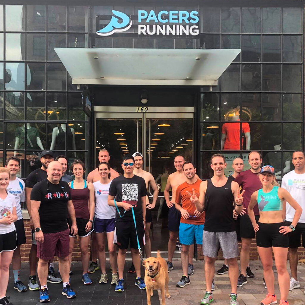 Runners in front of Pacers Running shop